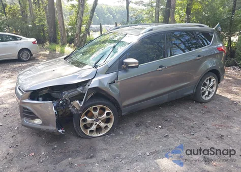 2014 Ford Escape Titanium z USA, uszkodzony, nr VIN 1FMCU0J91EUC89786